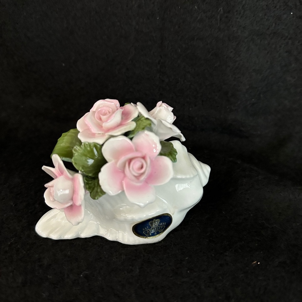 Ansley Fine bone China conch shell with pink floral arrangement